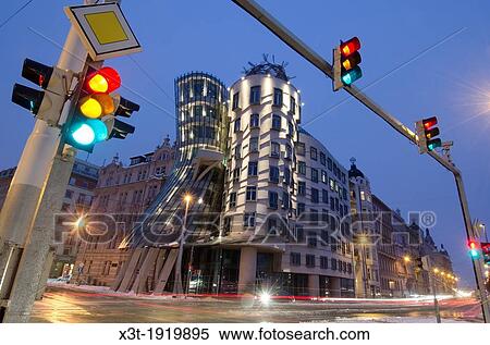 evening winter shot, Dancing House, Prague, Czech Republic Dancing House was designed by Vlado Milunic and Frank Gehry The building was completed in 1996 View Large Photo Image Stock Photography - evening winter shot, Dancing House, Prague, Czech Republic Dancing House was designed by Vlado Milunic and Frank Gehry The building was completed in 1996. Fotosearch