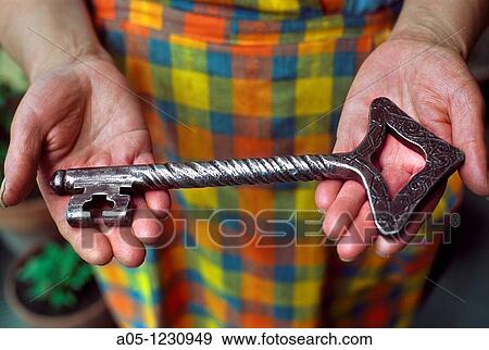 Stock Photo - Exact copy of the wrought iron key stolen in the mid-twentieth century of the Church of Sant Marti Cortinada ANDORRA.. Fotosearch