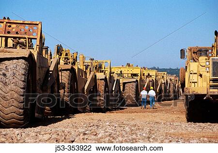 Stock Image - Excavating machines. Lincoln, California. USA.. Fotosearch