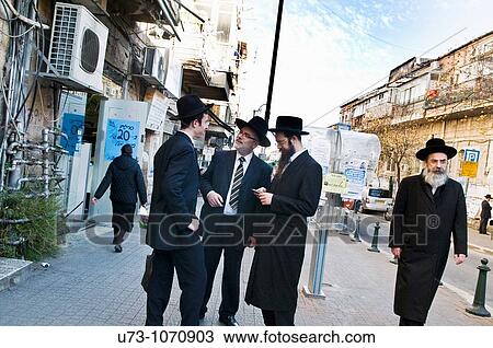 exchange of ideas in the middle of Mea Shearim neighborhood, Jerusalem. View Large Photo Image Stock Image - exchange of ideas in the middle of Mea Shearim neighborhood, Jerusalem.. Fotosearch