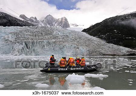 excursion with zodiac around the Pia Glacier, Cordillera Darwin, Beagle Channel Northeast branch, Tierra del Fuego, Patagonia, Chile, South America View Large Photo Image Stock Photo - excursion with zodiac around the Pia Glacier, Cordillera Darwin, Beagle Channel Northeast branch, Tierra del Fuego, Patagonia, Chile, South America. Fotosearch