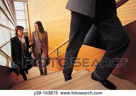 Executive climbing stairs View Large Photo Image Stock Image - Executive climbing stairs. Fotosearch