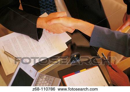 Executive handshake View Large Photo Image Stock Photograph - Executive handshake. Fotosearch