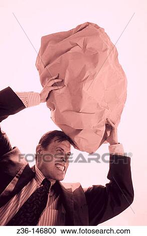 Executive holding big rock View Large Photo Image Stock Image - Executive holding big rock. Fotosearch