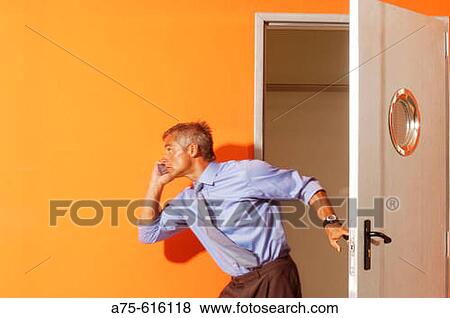 Stock Photo - Executive in a Rush. Fotosearch