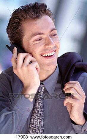 Executive on cell phone View Large Photo Image Stock Photo - Executive on cell phone. Fotosearch