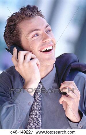 Executive on cell phone View Large Photo Image Stock Photo - Executive on cell phone. Fotosearch