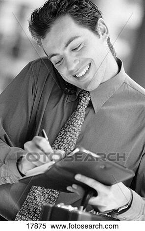Executive on cell phone View Large Photo Image Stock Photography - Executive on cell phone. Fotosearch