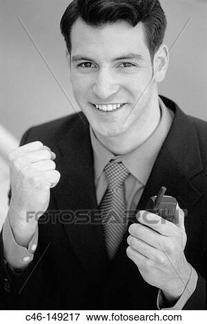 Stock Photo - Executive with cellular phone. Fotosearch
