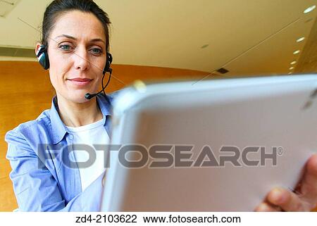 Executive with digital tablet View Large Photo Image Stock Image - Executive with digital tablet. Fotosearch