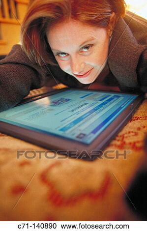Executive woman with laptop computer View Large Photo Image Stock Image - Executive woman with laptop computer. Fotosearch