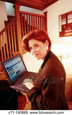 Executive woman with laptop computer View Large Photo Image Stock Photo - Executive woman with laptop computer. Fotosearch