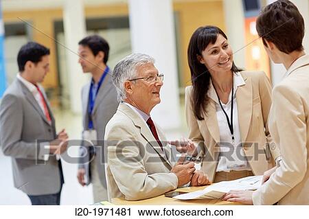 Stock Image - Executives at Convention Center, Business, Donostia, San Sebastian, Basque Country, Spain.. Fotosearch