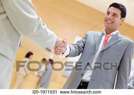Stock Image - Executives at Convention Center, Business, Donostia, San Sebastian, Basque Country, Spain.. Fotosearch