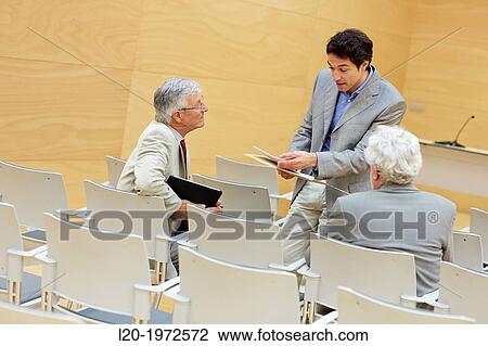 Stock Image - Executives at Convention Centre, Coaching, Business, Donostia, San Sebastian, Basque Country, Spain.. Fotosearch