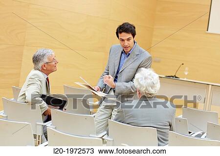 Stock Image - Executives at Convention Centre, Coaching, Business, Donostia, San Sebastian, Basque Country, Spain.. Fotosearch