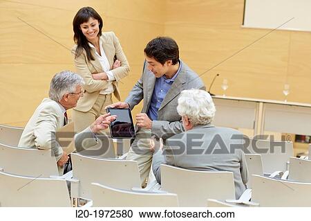 Stock Image - Executives at Convention Centre, Coaching, Business, Donostia, San Sebastian, Basque Country, Spain.. Fotosearch