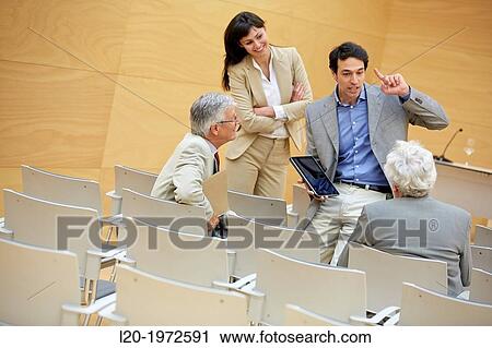 Stock Image - Executives at Convention Centre, Coaching, Business, Donostia, San Sebastian, Basque Country, Spain.. Fotosearch