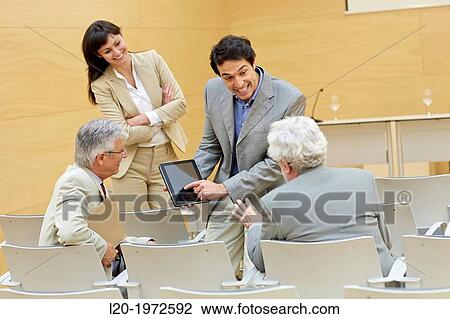 Stock Image - Executives at Convention Centre, Coaching, Business, Donostia, San Sebastian, Basque Country, Spain.. Fotosearch