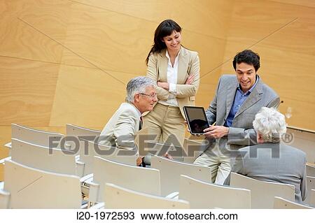 Stock Image - Executives at Convention Centre, Coaching, Business, Donostia, San Sebastian, Basque Country, Spain.. Fotosearch