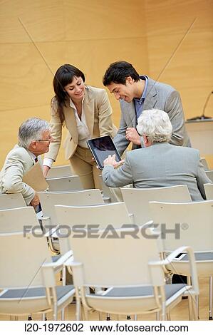 Stock Image - Executives at Convention Centre, Coaching, Business, Donostia, San Sebastian, Basque Country, Spain.. Fotosearch