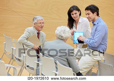 Stock Image - Executives at Convention Centre, Coaching, Business, Donostia, San Sebastian, Basque Country, Spain.. Fotosearch