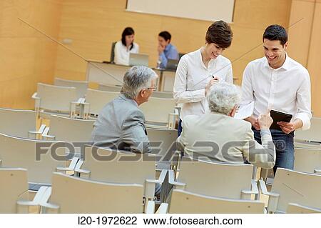 Stock Image - Executives at Convention Centre, Coaching, Business, Donostia, San Sebastian, Basque Country, Spain.. Fotosearch
