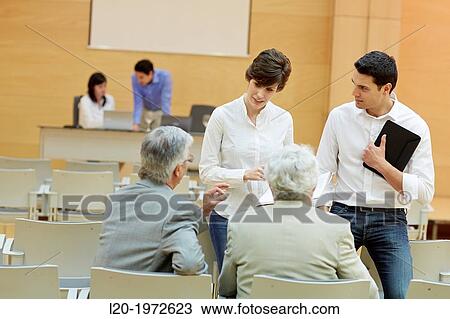 Stock Image - Executives at Convention Centre, Coaching, Business, Donostia, San Sebastian, Basque Country, Spain.. Fotosearch