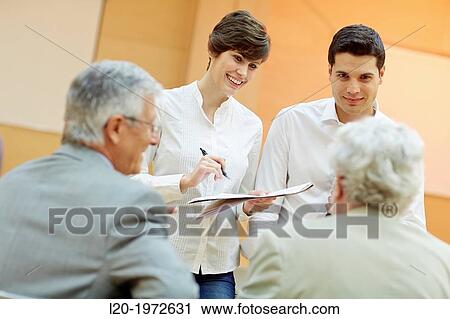 Stock Image - Executives at Convention Centre, Coaching, Business, Donostia, San Sebastian, Basque Country, Spain.. Fotosearch
