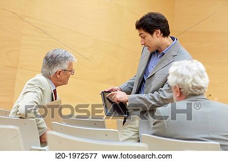 Stock Photo - Executives at Convention Centre, Coaching, Business, Donostia, San Sebastian, Basque Country, Spain.. Fotosearch