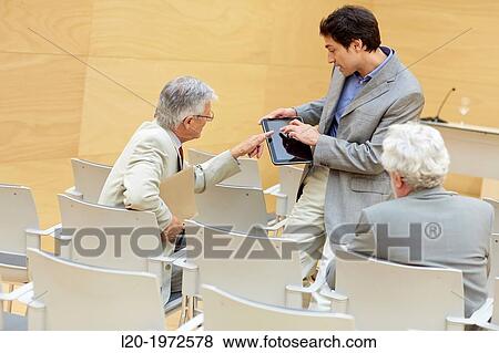 Stock Photo - Executives at Convention Centre, Coaching, Business, Donostia, San Sebastian, Basque Country, Spain.. Fotosearch