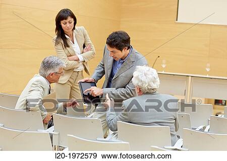Stock Photo - Executives at Convention Centre, Coaching, Business, Donostia, San Sebastian, Basque Country, Spain.. Fotosearch