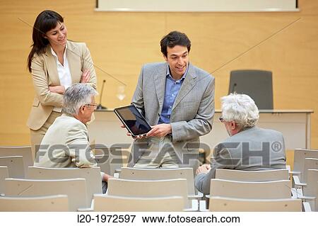 Stock Photo - Executives at Convention Centre, Coaching, Business, Donostia, San Sebastian, Basque Country, Spain.. Fotosearch