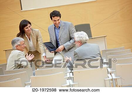 Stock Photo - Executives at Convention Centre, Coaching, Business, Donostia, San Sebastian, Basque Country, Spain.. Fotosearch