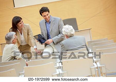 Stock Photo - Executives at Convention Centre, Coaching, Business, Donostia, San Sebastian, Basque Country, Spain.. Fotosearch