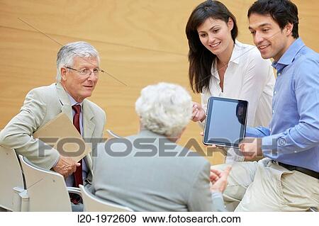 Stock Photo - Executives at Convention Centre, Coaching, Business, Donostia, San Sebastian, Basque Country, Spain.. Fotosearch