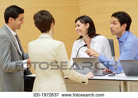 Stock Photo - Executives at Convention Centre, Business, Donostia, San Sebastian, Basque Country, Spain.. Fotosearch