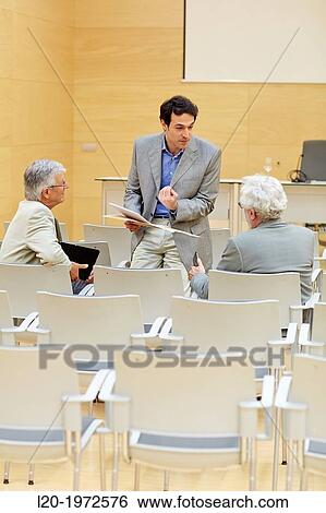 Stock Photograph - Executives at Convention Centre, Coaching, Business, Donostia, San Sebastian, Basque Country, Spain.. Fotosearch