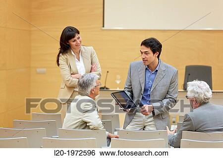 Stock Photograph - Executives at Convention Centre, Coaching, Business, Donostia, San Sebastian, Basque Country, Spain.. Fotosearch