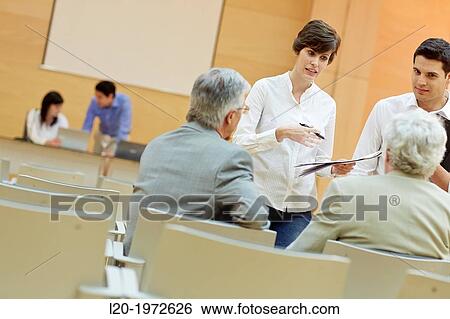 Stock Photograph - Executives at Convention Centre, Coaching, Business, Donostia, San Sebastian, Basque Country, Spain.. Fotosearch