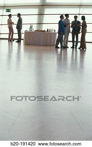Executives at trade show, break time View Large Photo Image Stock Image - Executives at trade show, break time. Fotosearch