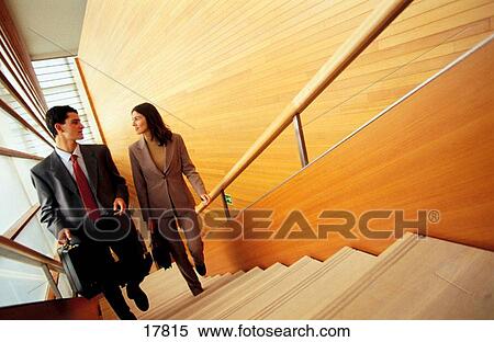Executives climbing stairs View Large Photo Image Stock Photography - Executives climbing stairs. Fotosearch