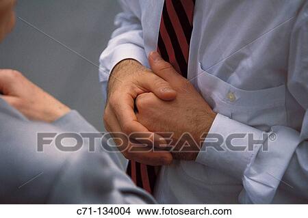 Picture - Executives, hands. Fotosearch