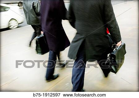 executives moving foreground walking around town, London Bridge, City of London, England, UK View Large Photo Image Stock Photo - executives moving foreground walking around town, London Bridge, City of London, England, UK. Fotosearch