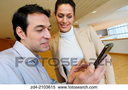 Executives using smartphone View Large Photo Image Stock Photography - Executives using smartphone. Fotosearch