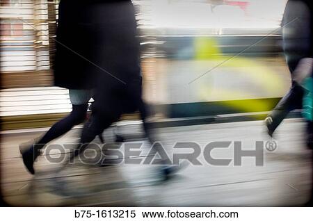 executives walk down the street View Large Photo Image Stock Photography - executives walk down the street. Fotosearch