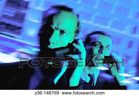 Stock Photo - Executives with cell phone. Fotosearch