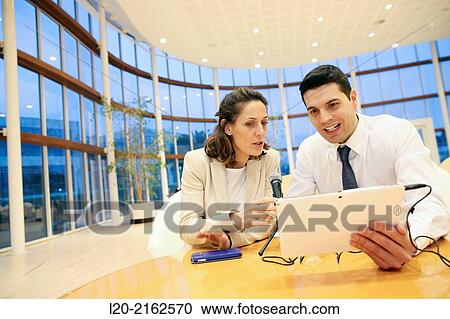 Executives with digital tablet, video conference View Large Photo Image Stock Image - Executives with digital tablet, video conference. Fotosearch