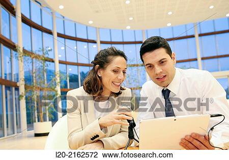 Executives with digital tablet, video conference View Large Photo Image Stock Image - Executives with digital tablet, video conference. Fotosearch