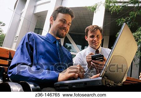 Executives with laptop computer View Large Photo Image Stock Photography - Executives with laptop computer. Fotosearch